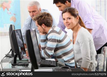 Young people working at computers