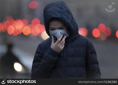 Young Person wearing Anti-Pollution Mask, Polluted Air, City Street