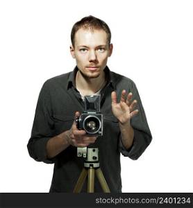 Young photographer taking pictures with medium-format camera, isolated on white background