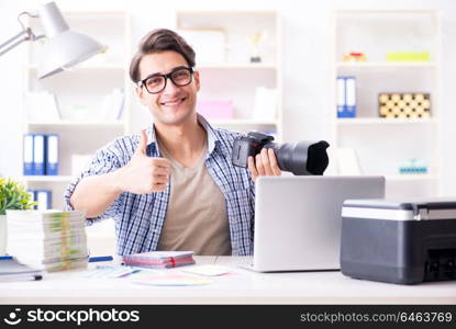 Young photographer working with his camera