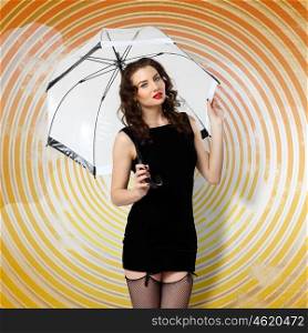 Young prestty woman dressed in retro style with umbrella