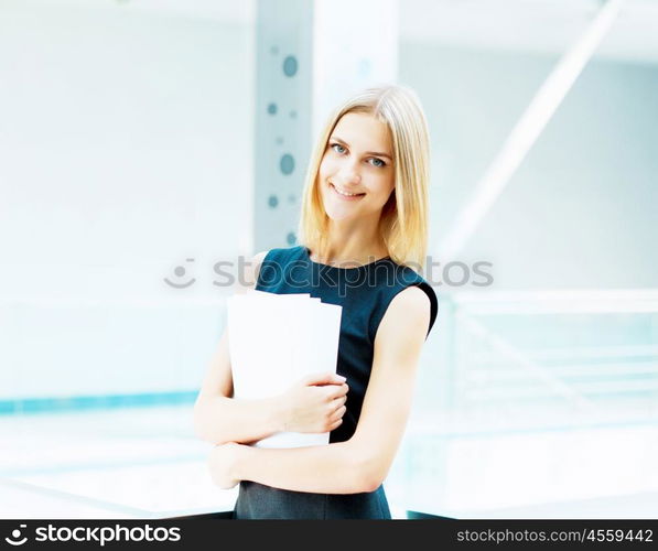 young pretty business woman.... A portrait of a young business woman in an office