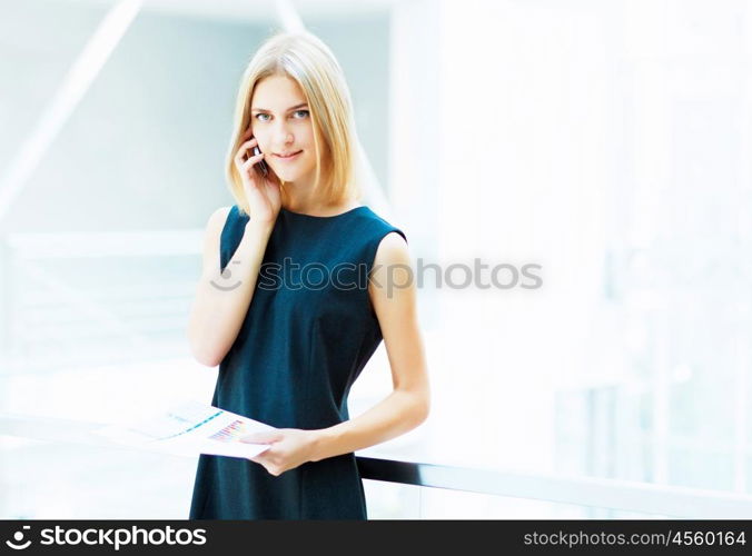 young pretty business woman.... A portrait of a young business woman in an office