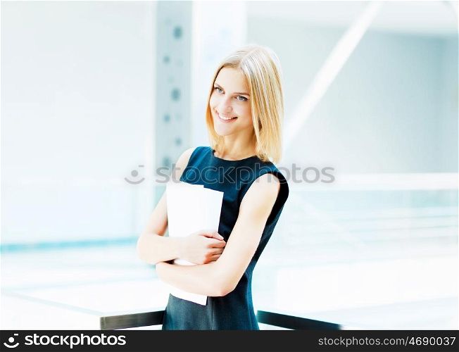 young pretty business woman.... A portrait of a young business woman in an office