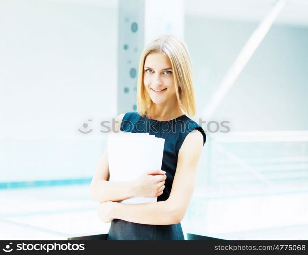 young pretty business woman.... A portrait of a young business woman in an office