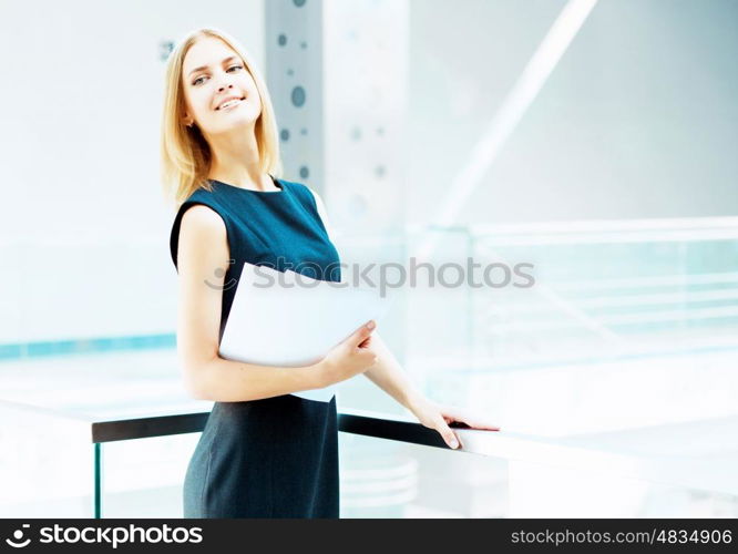 young pretty business woman.... A portrait of a young business woman in an office