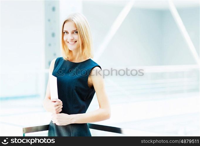 young pretty business woman.... A portrait of a young business woman in an office