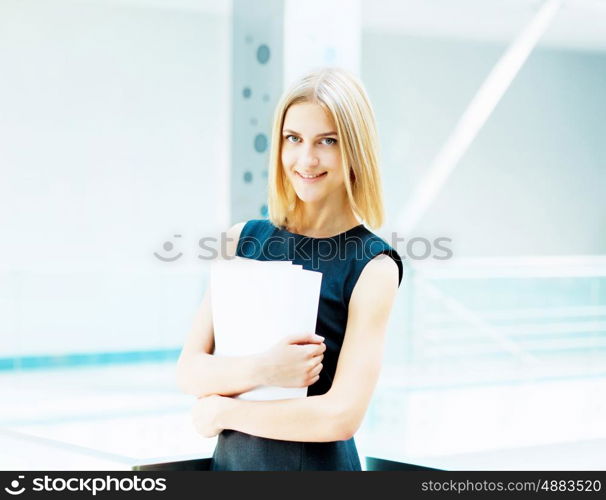 young pretty business woman.... A portrait of a young business woman in an office