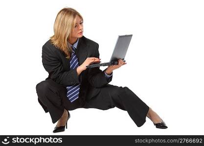 Young pretty businesswoman in big suit with laptop