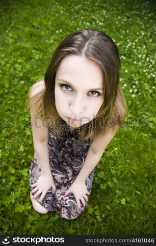 Young Pretty Expression Lady On The Grass