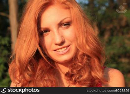 Young pretty red hair woman outdoor fashion autumn portrait