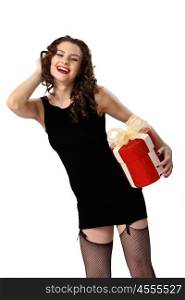 Young pretty woman in black dress with a gift box