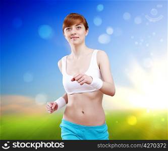Young pretty woman in sport wear running