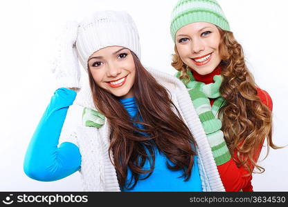 Young pretty woman in warm winter hat and scarf