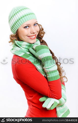 Young pretty woman in warm winter hat and scarf