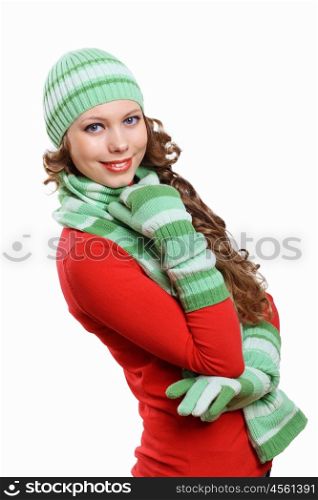 Young pretty woman in warm winter hat and scarf
