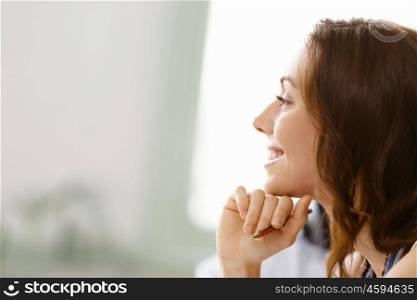 Young pretty woman indoors. Young pretty woman smiling portrait indoors