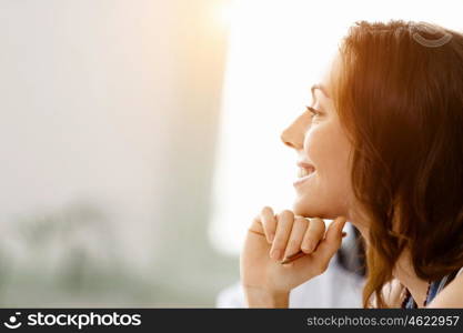 Young pretty woman indoors. Young pretty woman smiling portrait indoors