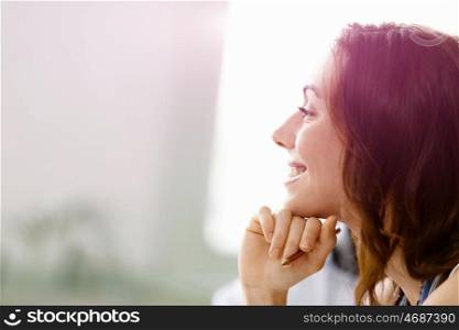 Young pretty woman indoors. Young pretty woman smiling portrait indoors