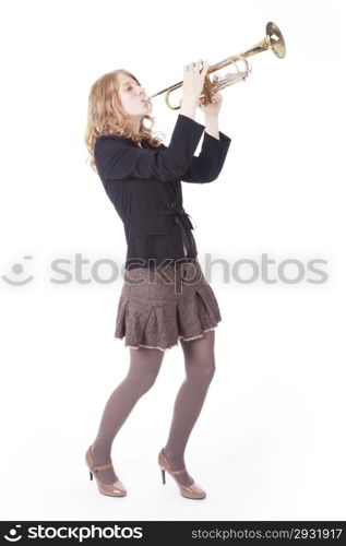 young pretty woman playing the trumpet against white background