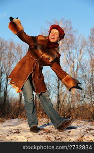 young pretty woman posing outdoor in winter