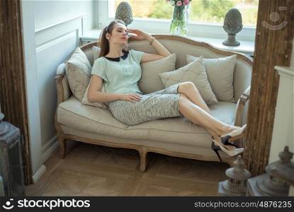 Young pretty woman relaxing at home
