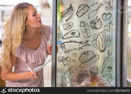 Young pretty woman thinking of healthy food while shopping at grocery store closeup portrait and sketches overhead