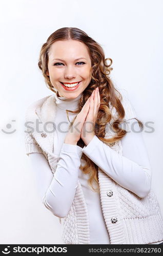 Young pretty woman with long hair wearing warm pullover