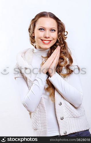 Young pretty woman with long hair wearing warm pullover