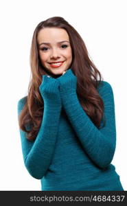 Young pretty woman with long hair wearing warm pullover