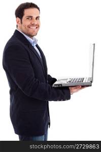 Young professional smiling with a laptop in his hand on a isolated white background