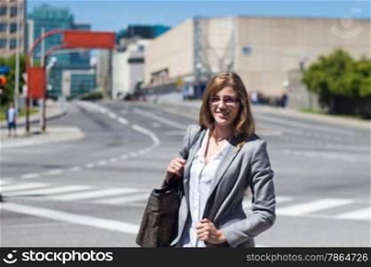 Young professional woman on a downtown street