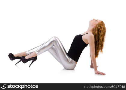 Young redhead girl in tight leggings