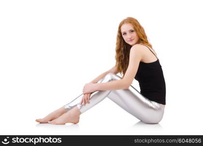 Young redhead girl in tight leggings