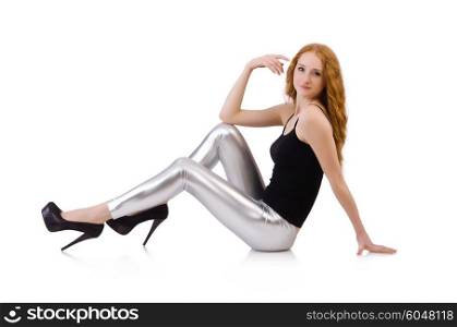 Young redhead girl in tight leggings