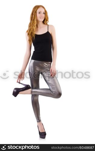 Young redhead girl in tight leggings