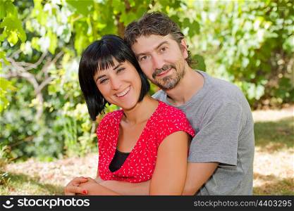 young romantic couple in the park