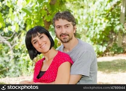 young romantic couple in the park