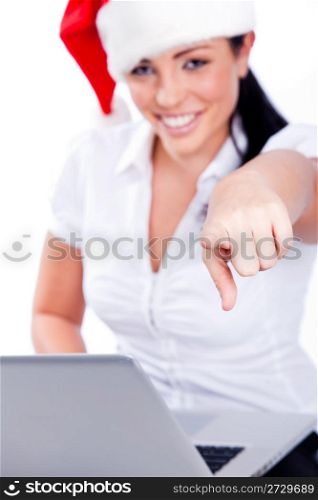 Young santa woman pointing at the camera on a white isolated backgroud