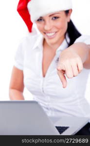 Young santa woman pointing at the camera on a white isolated backgroud