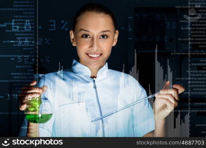 Young scientist in laboratory in white uniform