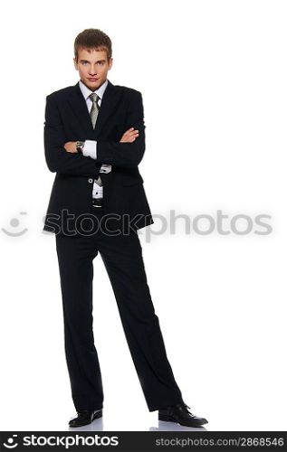 Young serious businessman isolated on white