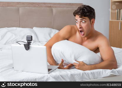 Young sexy man in online dating concept