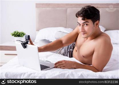 Young sexy man in online dating concept. The young sexy man in online dating concept