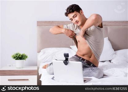 Young sexy man in online dating concept. The young sexy man in online dating concept