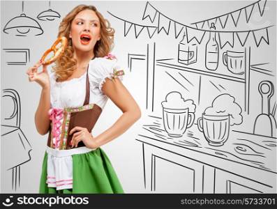 Young sexy Oktoberfest woman wearing a traditional Bavarian dress dirndl eating a pretzel on sketchy bar counter background.
