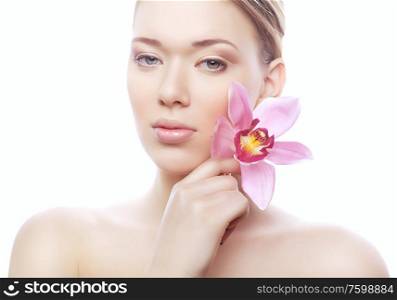 young shiny woman with pink flower on white background
