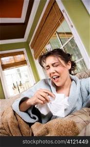 Young Sick Woman Sneezing