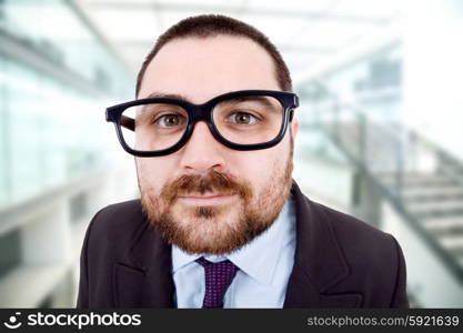 young silly business man portrait at the office