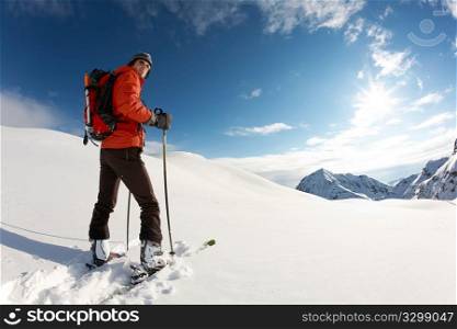 Young skier ready for skiing, italian alps; horizontal frame